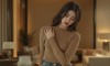 A_young_Korean_woman_wearing_tight_jeans_delicate-1739324634719.jpg